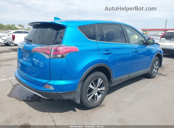 JTMWFREV0HD095052 2017 TOYOTA RAV4 Light Blue Tył prawy