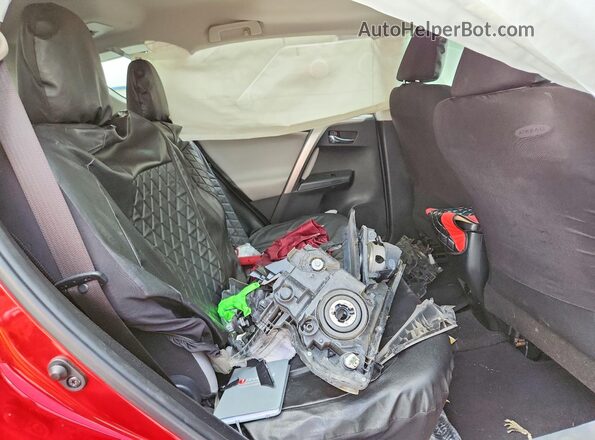 JTMWFREV0HJ117617 2017 TOYOTA RAV4 Red Rear interior view