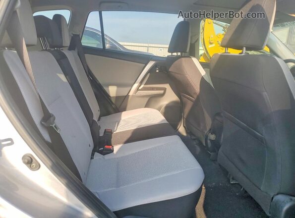 JTMWFREV0JD130436 2018 TOYOTA RAV4 Серебряный Вид задней части салона