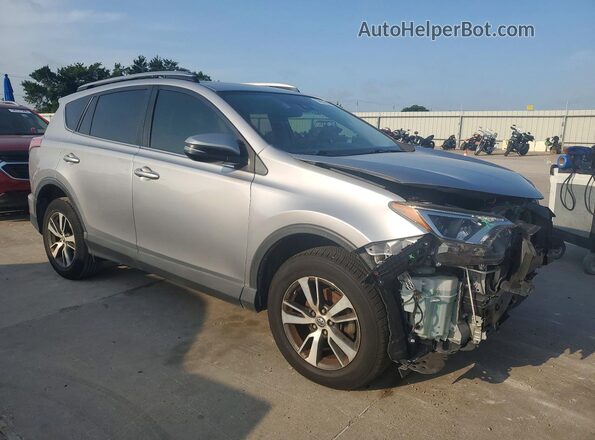 JTMWFREV0JD130436 2018 TOYOTA RAV4 Серебряный Передняя правая четверть