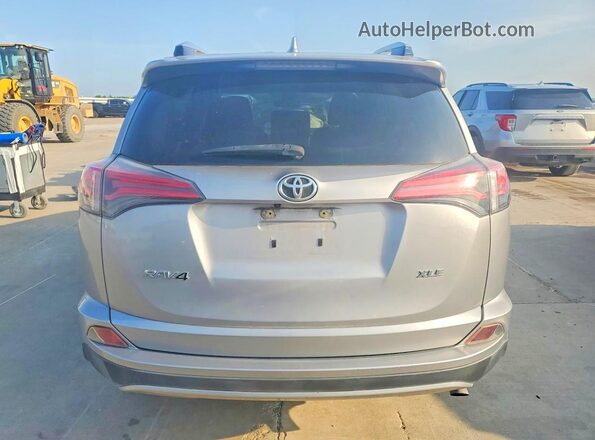 JTMWFREV0JD130436 2018 TOYOTA RAV4 Серебряный Вид сзади