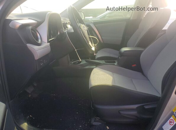 JTMWFREV0JD130436 2018 TOYOTA RAV4 Серебряный Вид салона спереди