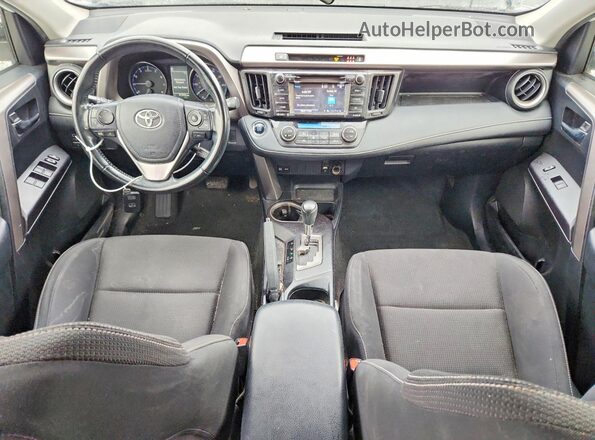 JTMWFREV0JJ747420 2018 TOYOTA RAV4 White Dashboard view