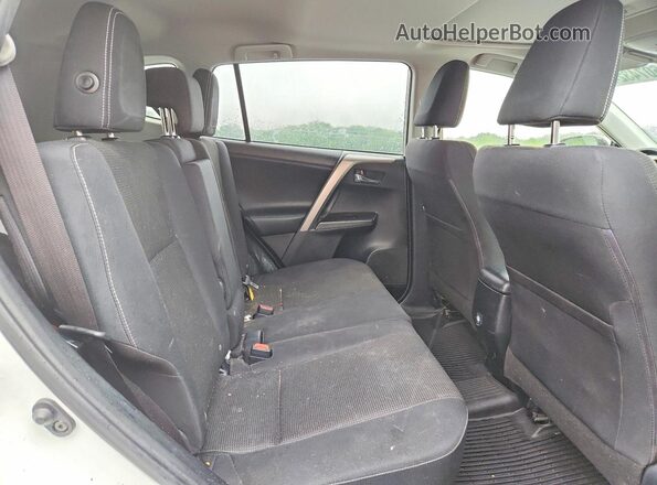 JTMWFREV0JJ747420 2018 TOYOTA RAV4 White Rear interior view