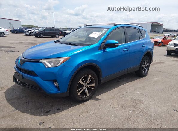 JTMWFREV1GJ083962 2016 TOYOTA RAV4 Blue Առջևի ձախ երեք քառորդ տեսարան