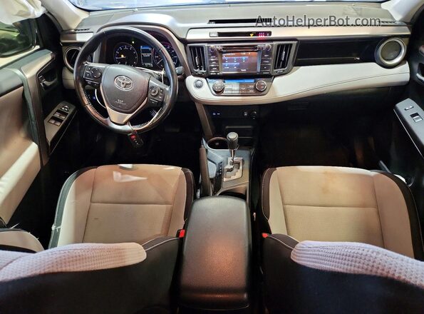 JTMWFREV1HJ140162 2017 TOYOTA RAV4 Gray Widok deski rozdzielczej