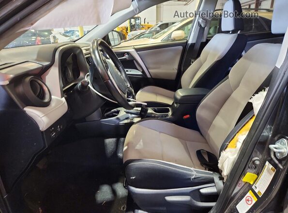 JTMWFREV1HJ140162 2017 TOYOTA RAV4 Gray Widok wnętrza z przodu