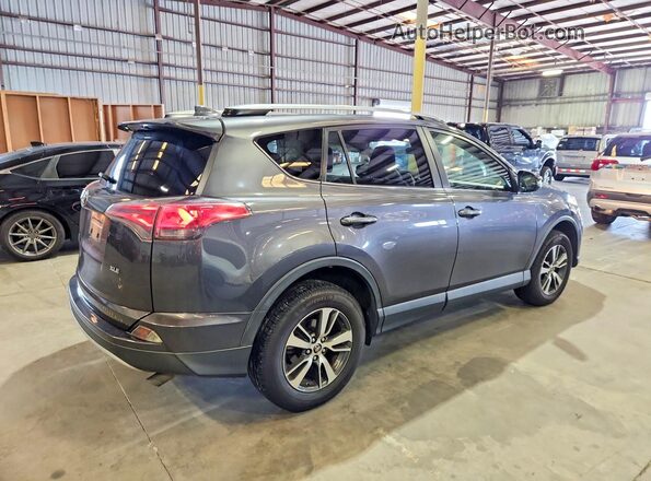 JTMWFREV1HJ140162 2017 TOYOTA RAV4 Gray Tył prawy