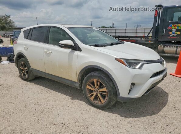 JTMWFREV1HJ718180 2017 TOYOTA RAV4 White Front right