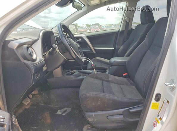 JTMWFREV1HJ718180 2017 TOYOTA RAV4 White Front interior view