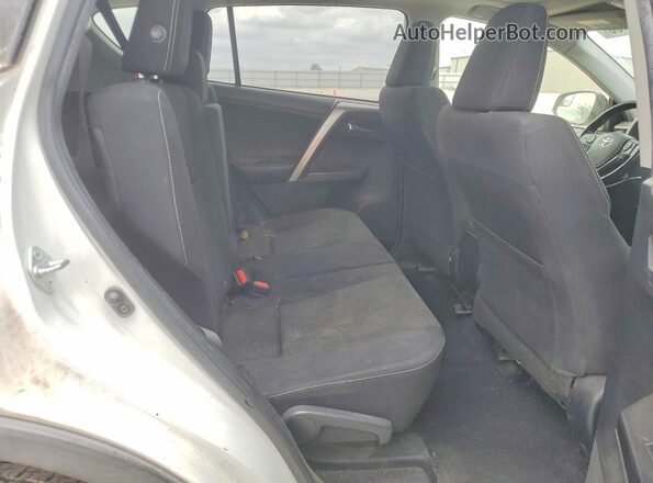 JTMWFREV1HJ718180 2017 TOYOTA RAV4 White Rear seats view