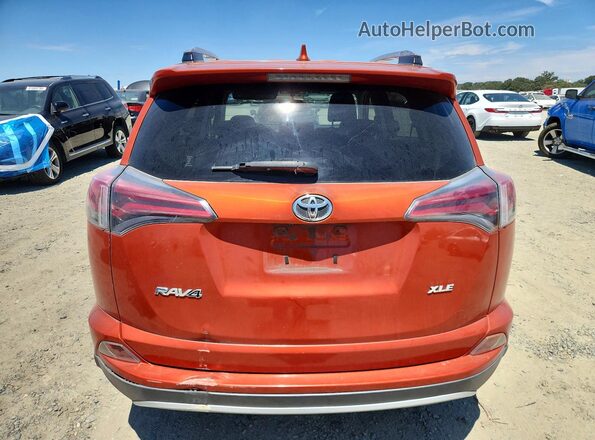 JTMWFREV2GJ075255 2016 TOYOTA RAV4 Orange უკანა ხედი