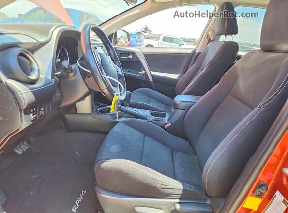 JTMWFREV2GJ075255 2016 TOYOTA RAV4 Orange წინა სალონის ხედი
