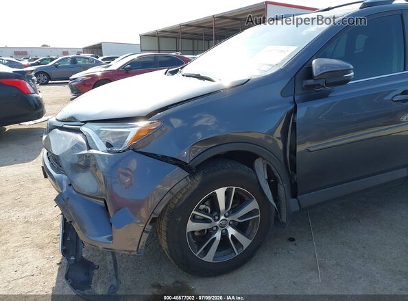 JTMWFREV2HD102387 2017 TOYOTA RAV4 Серый Вид спереди