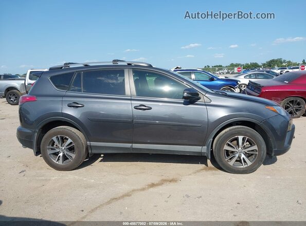JTMWFREV2HD102387 2017 TOYOTA RAV4 Серый Вид задней части салона