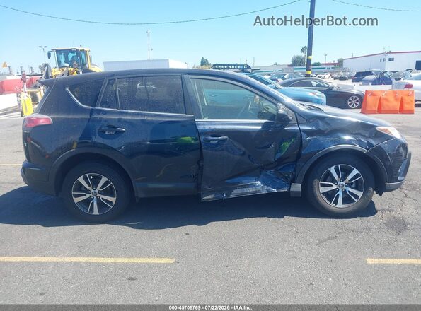 JTMWFREV2HJ146178 2017 TOYOTA RAV4 Black უკანა სალონის ხედი