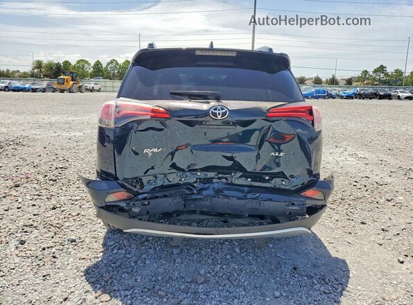 JTMWFREV2JD115372 2018 TOYOTA RAV4 Gray Widok z tyłu