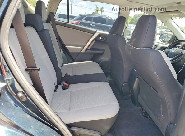 JTMWFREV2JD115372 2018 TOYOTA RAV4 Gray Widok wnętrza z tyłu
