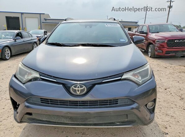 JTMWFREV2JD122838 2018 TOYOTA RAV4 Gray Vista frontal