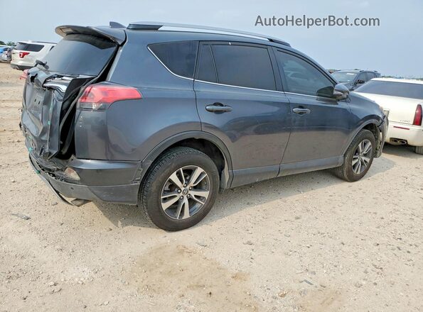 JTMWFREV2JD122838 2018 TOYOTA RAV4 Gray Trasero derecho