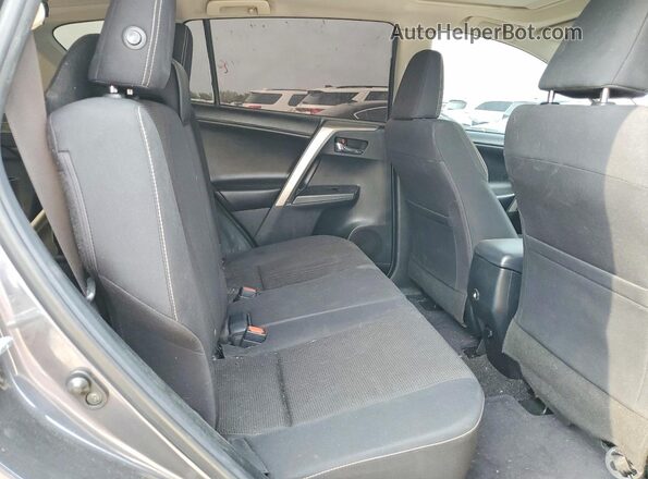 JTMWFREV2JD122838 2018 TOYOTA RAV4 Gray Vista interior trasera