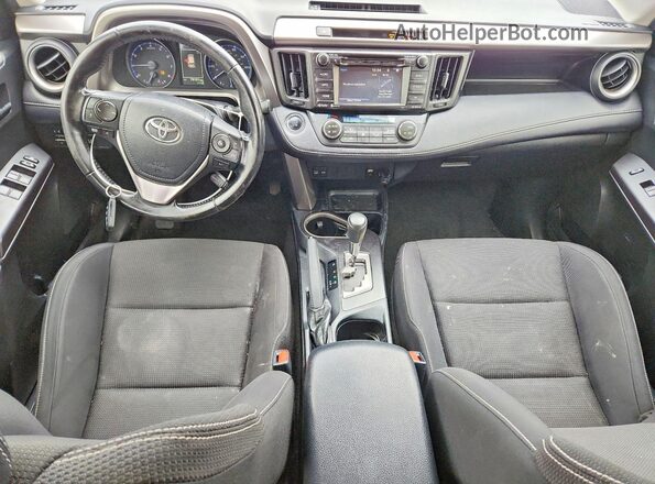 JTMWFREV2JJ170437 2018 TOYOTA RAV4 White Dashboard view