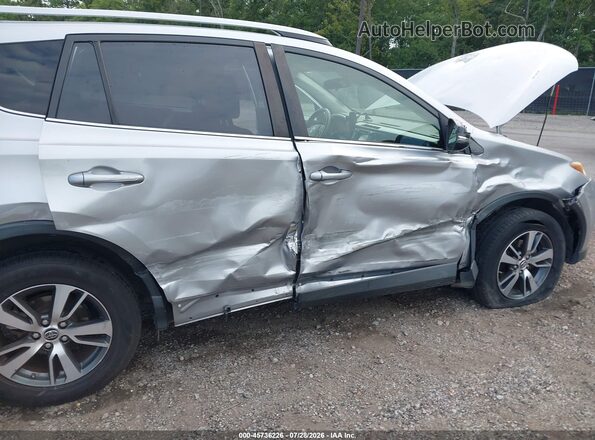JTMWFREV2JJ195886 2018 TOYOTA RAV4 Silver Вид спереду