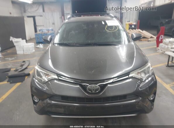 JTMWFREV2JJ738900 2018 TOYOTA RAV4 Gray ხელსაწყოთა პანელის ხედი