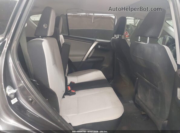 JTMWFREV2JJ738900 2018 TOYOTA RAV4 Gray VIN კოდის სტიკერის ხედი