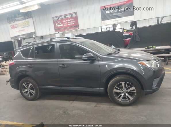 JTMWFREV2JJ738900 2018 TOYOTA RAV4 Gray უკანა სალონის ხედი