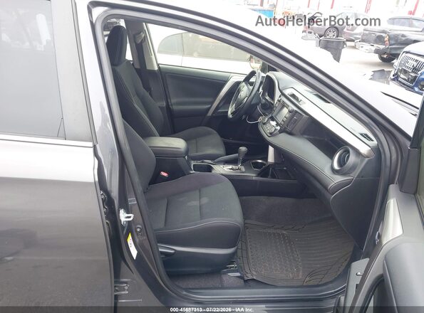 JTMWFREV3GJ094753 2016 TOYOTA RAV4 Gray Widok wnętrza z przodu