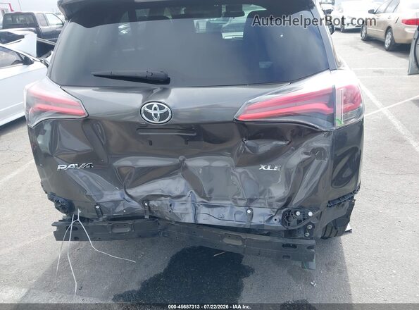 JTMWFREV3GJ094753 2016 TOYOTA RAV4 Gray Widok z przodu