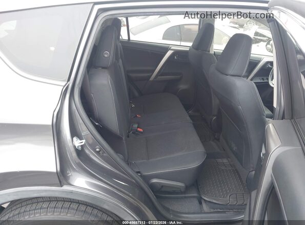 JTMWFREV3GJ094753 2016 TOYOTA RAV4 Gray Widok naklejki z numerem VIN