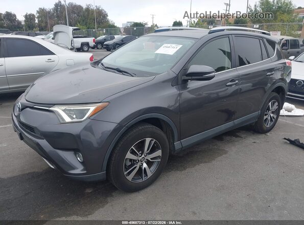 JTMWFREV3GJ094753 2016 TOYOTA RAV4 Gray Przód lewy