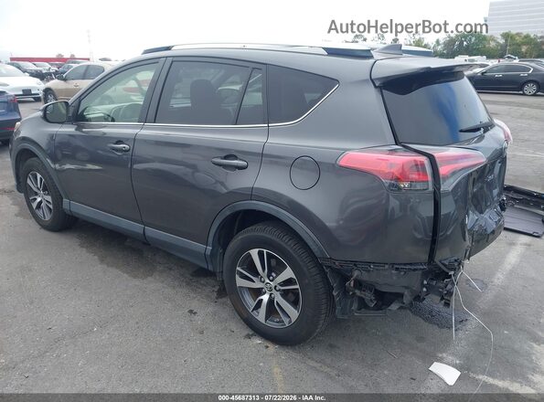 JTMWFREV3GJ094753 2016 TOYOTA RAV4 Gray Tył lewy