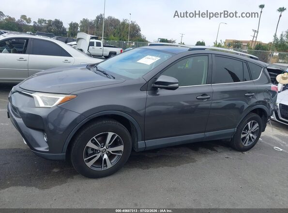 JTMWFREV3GJ094753 2016 TOYOTA RAV4 Gray 
