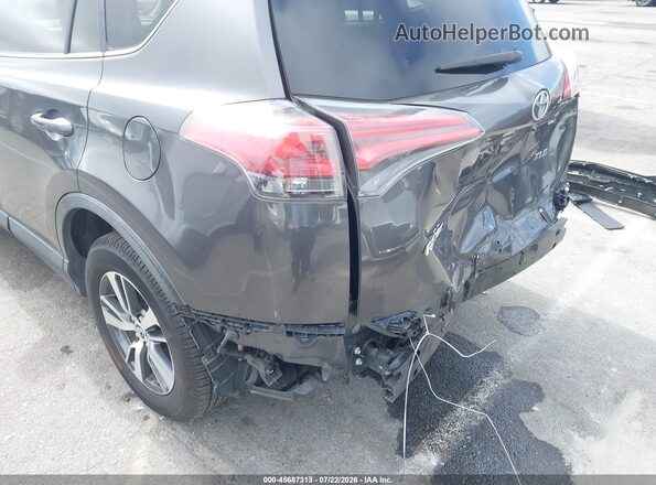 JTMWFREV3GJ094753 2016 TOYOTA RAV4 Gray Widok wnętrza z tyłu