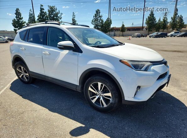 JTMWFREV3HD093974 2017 TOYOTA RAV4 White Przód prawy