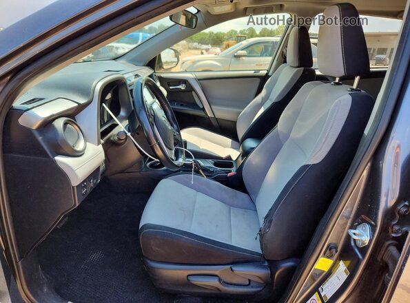 JTMWFREV3HD097300 2017 TOYOTA RAV4 Gray Вид салону спереду