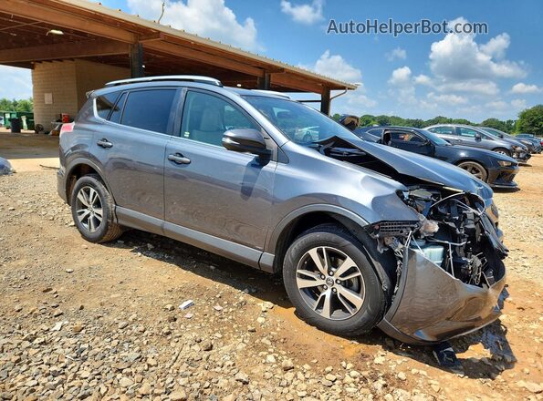 JTMWFREV3HD097300 2017 TOYOTA RAV4 Gray Передня права чверть