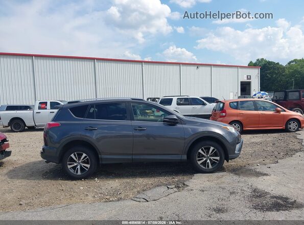 JTMWFREV3JJ748268 2018 TOYOTA RAV4 Silver Вид задньої частини салону