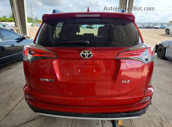 JTMWFREV4GJ073331 2016 TOYOTA RAV4 Red Հետևի տեսք