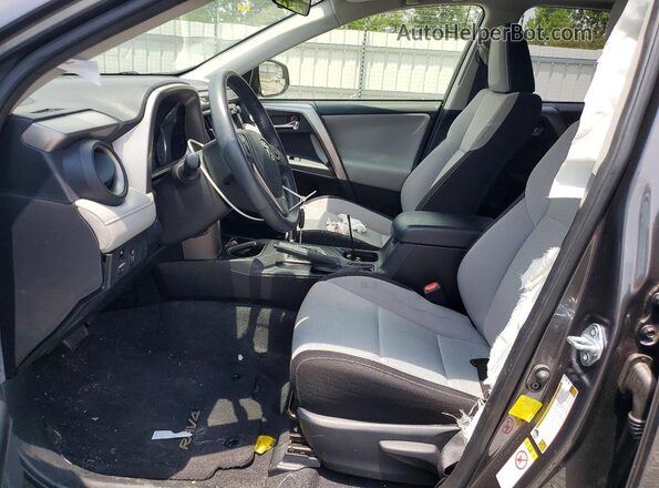 JTMWFREV4GJ099685 2016 TOYOTA RAV4 Gray Вид салону спереду