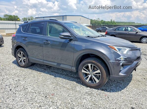JTMWFREV4GJ099685 2016 TOYOTA RAV4 Gray Передня права чверть