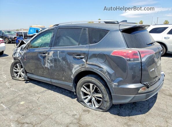 JTMWFREV5HD096522 2017 TOYOTA RAV4 Charcoal Rear left