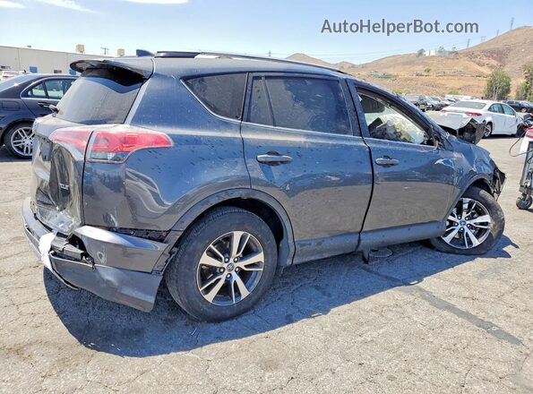 JTMWFREV5HD096522 2017 TOYOTA RAV4 Charcoal Rear right