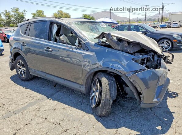 JTMWFREV5HD096522 2017 TOYOTA RAV4 Charcoal Front right