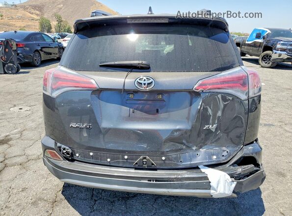 JTMWFREV5HD096522 2017 TOYOTA RAV4 Charcoal Rear view