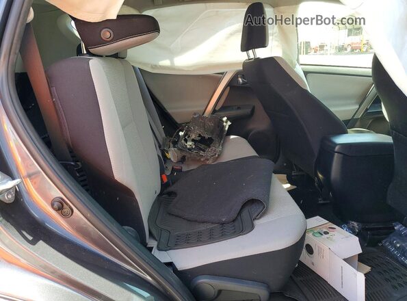 JTMWFREV5HD096522 2017 TOYOTA RAV4 Charcoal Rear interior view