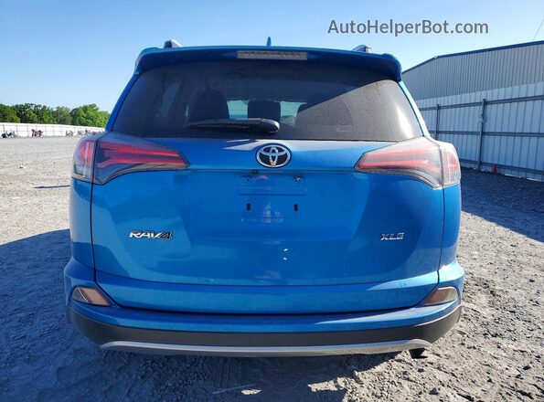 JTMWFREV5HJ712897 2017 TOYOTA RAV4 Blue Հետևի տեսք